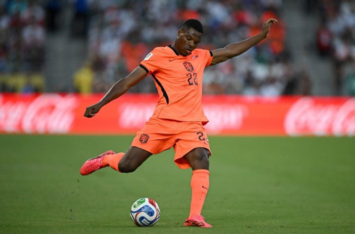 Netherlands' defender #22 Denzel Dumfries shoots during the 2026 World Cup round of 32 football match between the Netherlands and Morocco at the Monterrey Stadium in Guadalupe on June 29, 2026.   CARL DE SOUZA / AFP