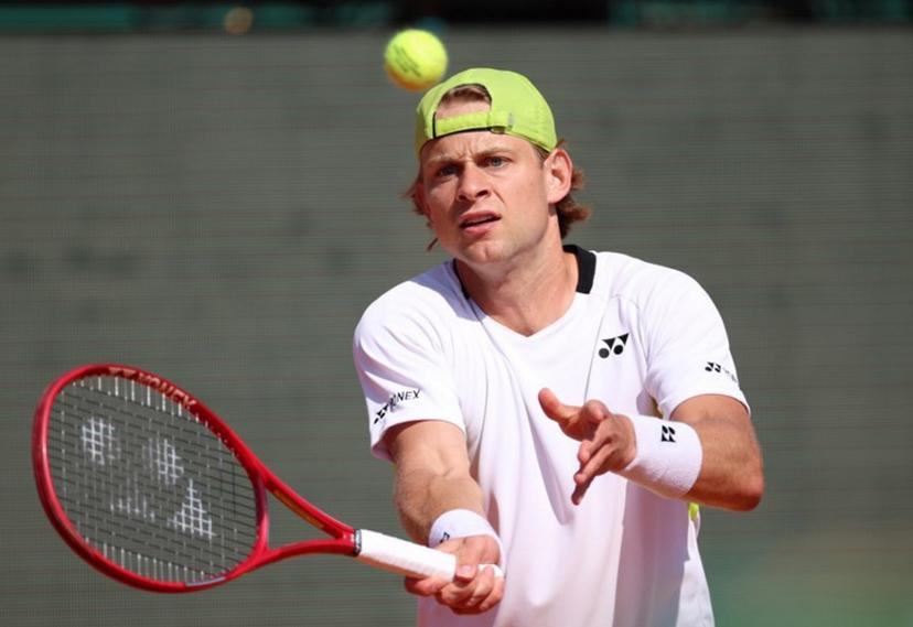 Belgium's Zizou Bergs plays a forehand return to Germany's Alexander Zverev during their Monte Carlo ATP Masters Series Tournament round of 16 tennis match on Court Rainier III at the Monte-Carlo Country Club in Roquebrune-Cap-Martin, south-eastern France on April 9, 2026.  Valery HACHE / AFP