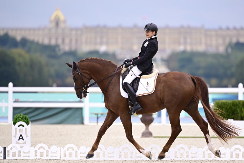 Belgian Barbara Minneci and her horse Stuart pictured in action during the Individual Freestyle Event Grade III equestrian event, on day 11 of the 2024 Summer Paralympic Games in Paris, France on Saturday 07 September 2024. The 17th Paralympics are taking place from 28 August to 8 September 2024 in Paris. BELGA PHOTO LAURIE DIEFFEMBACQ