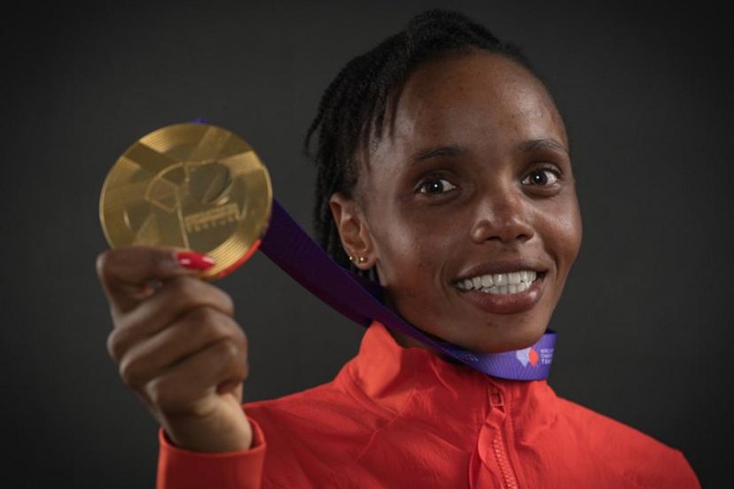 Women's 10000m final gold medallist Kenya's athlete Beatrice Chebet poses for portraits during a studio photo session on the sidelines of the World Athletics Championships in Tokyo on September 14, 2025.  Andrej ISAKOVIC / AFP