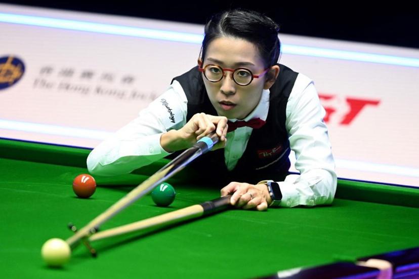 Ng On Yee of Hong Kong plays a shot during the fourth quarter-final match against Ronnie O'Sullivan of England at the Hong Kong Masters snooker tournament in Hong Kong on October 7, 2022.    Peter PARKS / AFP