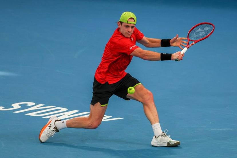 Belgium's Zizou Bergs hits a return to Czech Republic's Jakub Mensik during their men's singles quarter-final match at the United Cup tennis tournament in Sydney on January 8, 2026.  Izhar KHAN / AFP