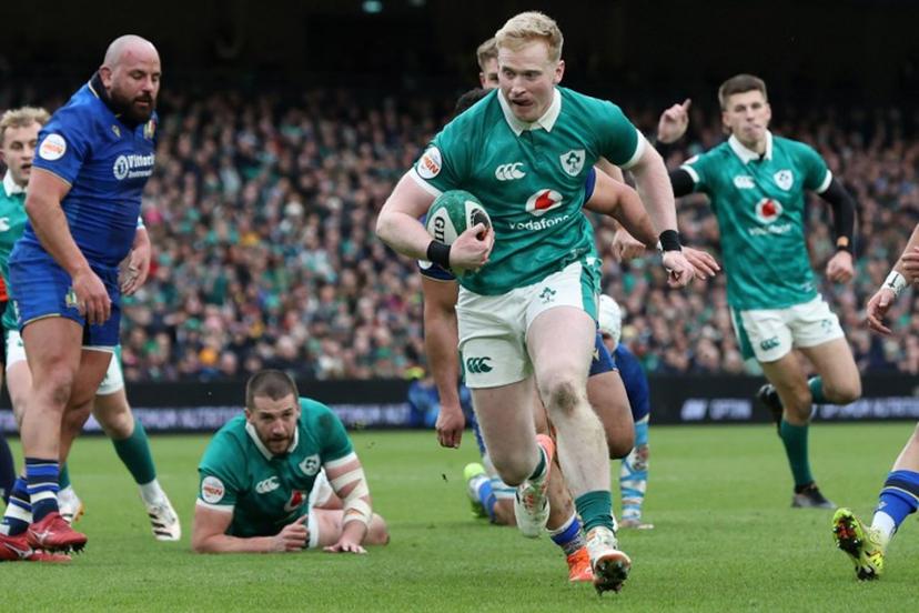 Ireland's full-back Jamie Osborne runs in their first try during the Six Nations international rugby union match between Ireland and Italy at the Aviva Stadium in Dublin, on February 14, 2026.  Paul Faith / AFP
