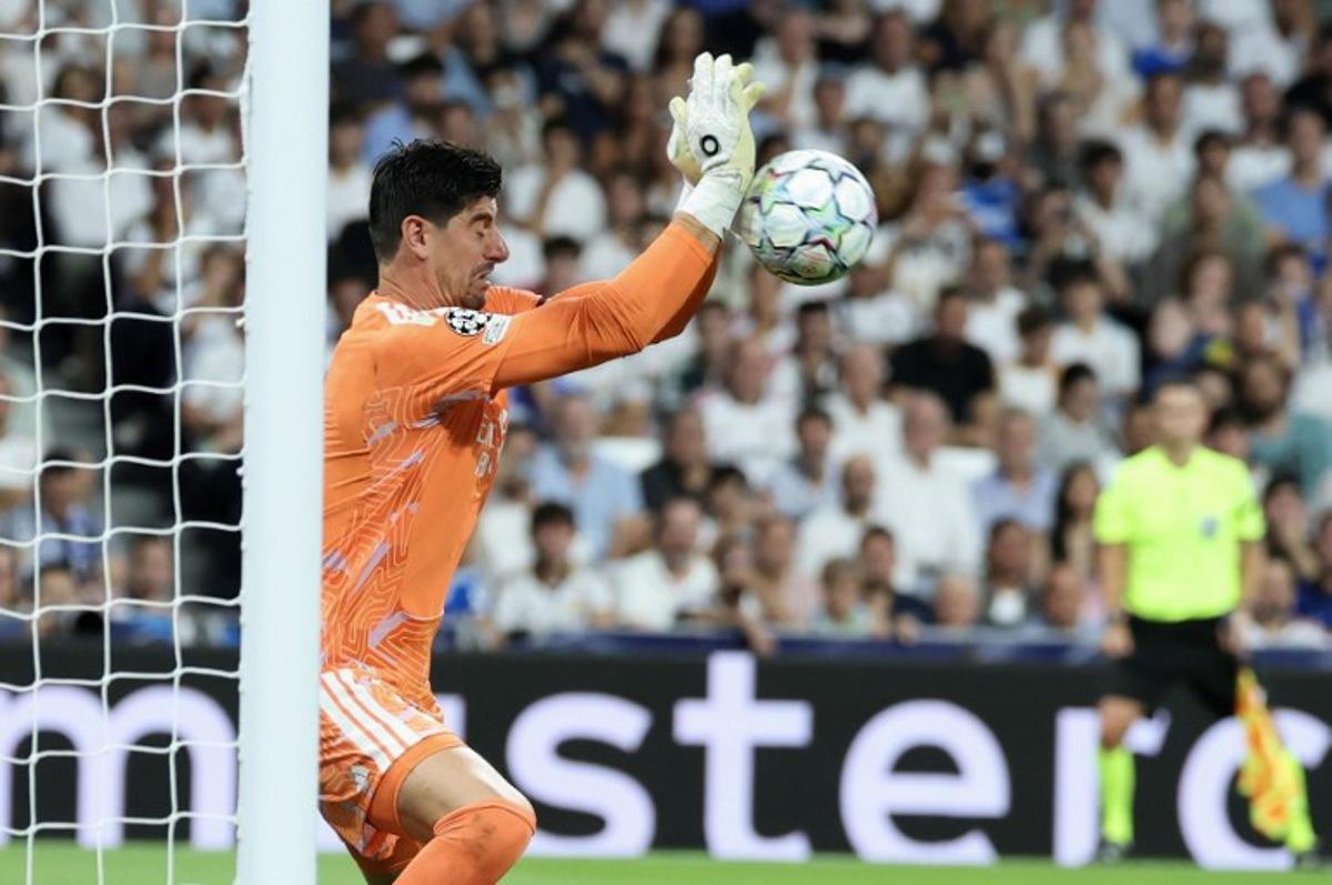 Real Madrid's Belgian goalkeeper #01 Thibaut Courtois makes a save during the UEFA Champions League first round day 1 football match between Real Madrid and Inter Milan at the Santiago Bernabeu stadium in Madrid on September 8, 2026.  Thomas COEX / AFP