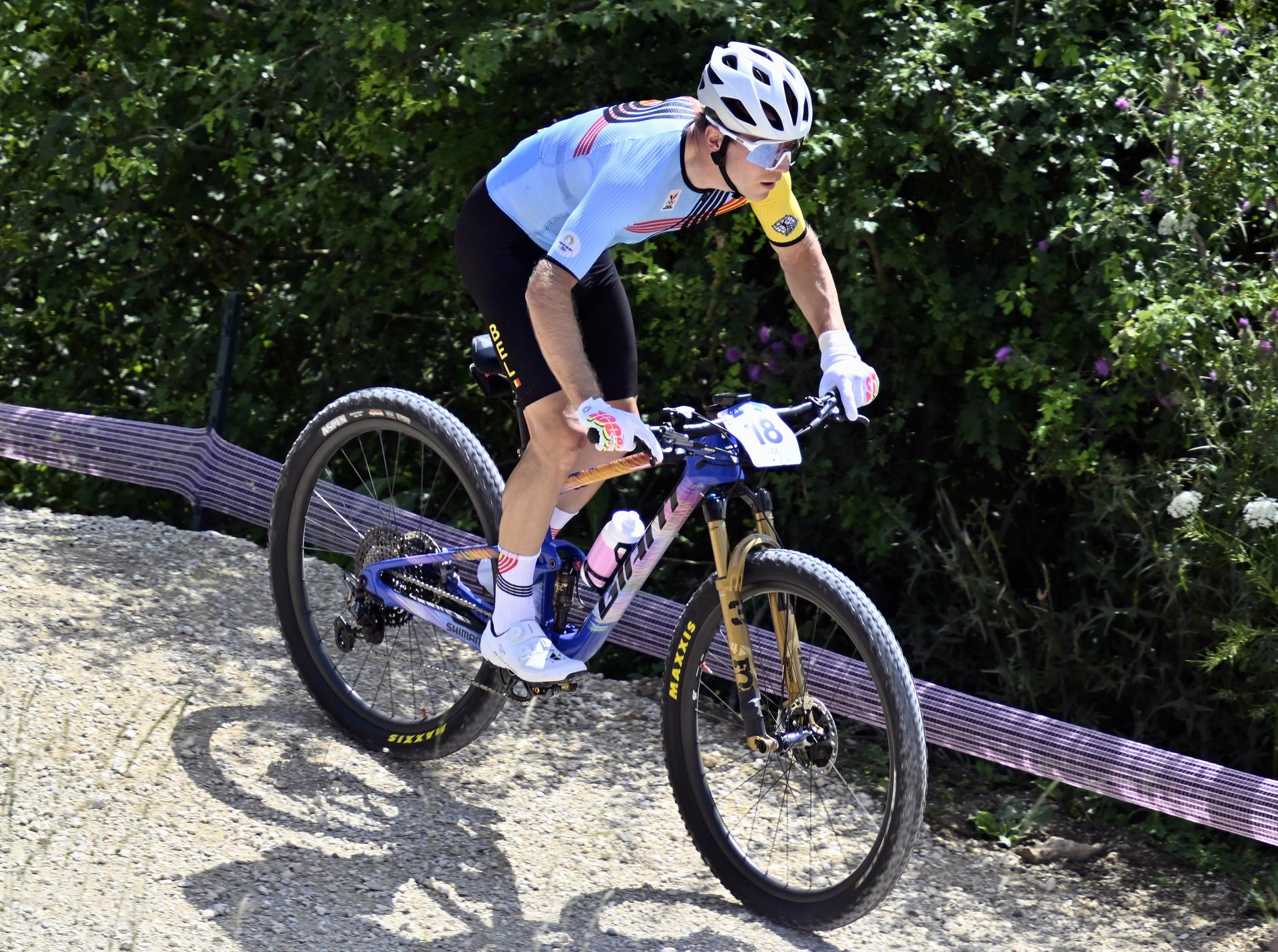 Belgian Jens Schuermans pictured in action during the men's cross-country mountain bike cycling race at the Paris 2024 Olympic Games, at the Colline d'Elancourt climb near Paris, France on Monday 29 July 2024. The Games of the XXXIII Olympiad are taking place in Paris from 26 July to 11 August. The Belgian delegation counts 165 athletes competing in 21 sports. BELGA PHOTO DIRK WAEM