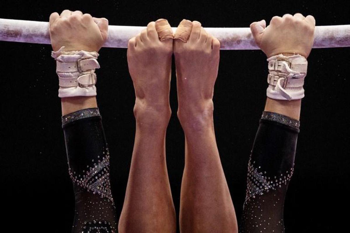 Italy's Asia D'amato competes in the uneven bars event at the women¿s team qualification during the Artistic Gymnastics World Championships at the Kitakyushu City Gymnasium in Kitakyushu, Fukuoka prefecture on October 18, 2021.  Philip FONG / AFP