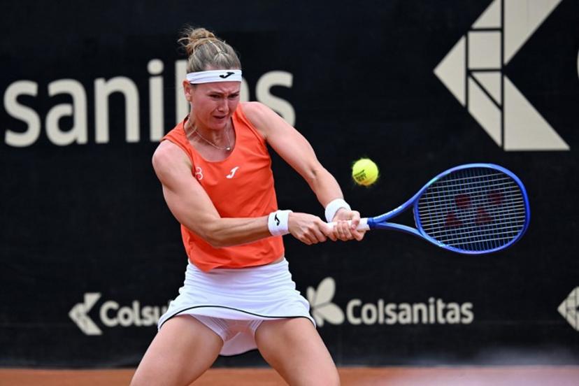 Czech Republic's Marie Bouzkova returns the ball to Hungary's Panna Udvardy during the WTA Bogota women's singles final match at the Country Club in Bogota on April 5, 2026.  RAUL ARBOLEDA / AFP