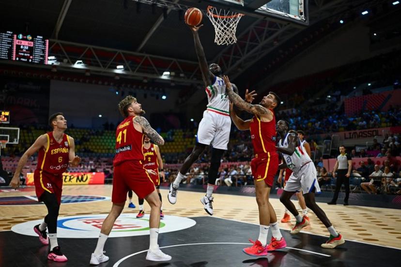 Italy's centre #35 Mouhamet Diouf scores during the FIBA EuroBasket 2025 basketball match between Italy and Spain at Spyros Kyprianou Arena in Limassol on September 2, 2025.  Jewel SAMAD / AFP