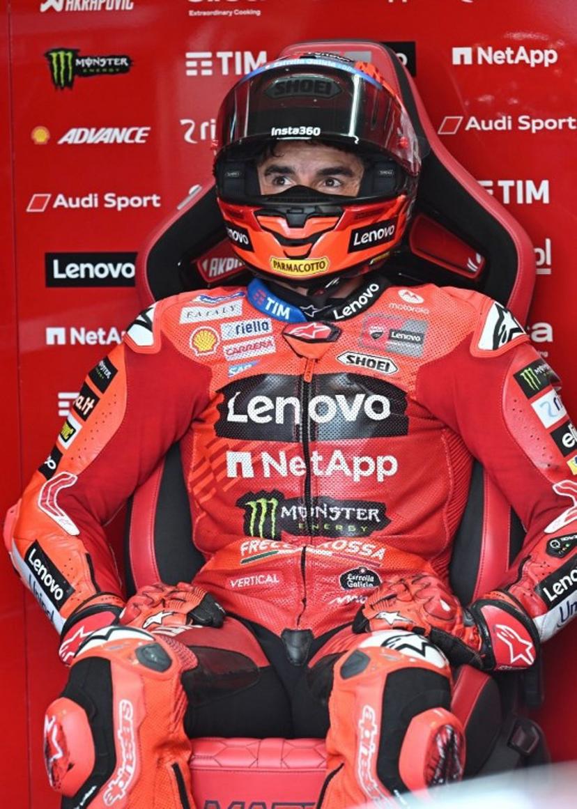 Ducati Lenovo Team's Spanish rider Marc Marquez looks on in the box during the practice of motorcycle Hungarian Moto GP Grand Prix at the Balaton Park circuit in Balatonfokajar, Hungary, on August 22, 2025.   ATTILA KISBENEDEK / AFP
