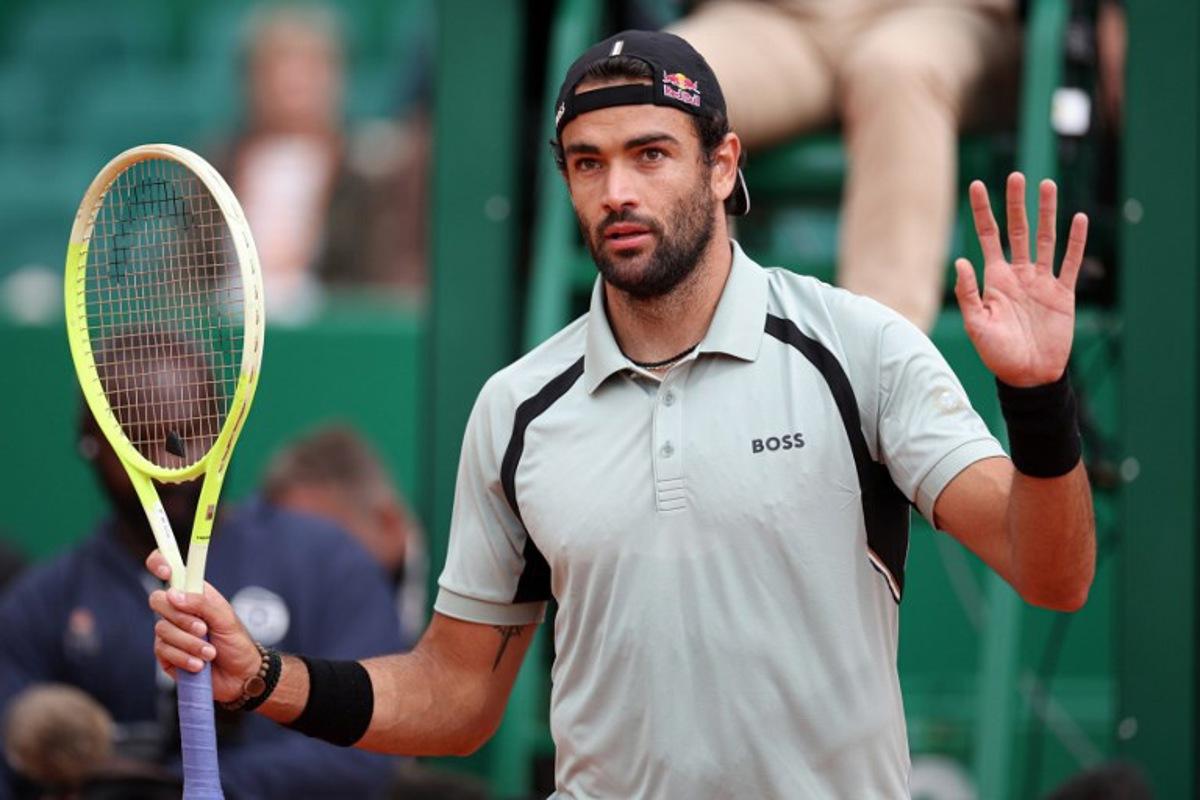 Italy's Matteo Berrettini reacts after winning against Spain's Roberto Bautista Agut following his retirement during the Monte Carlo ATP Masters Series Tournament round of 64 tennis match on Court Rainier III at the Monte-Carlo Country Club in Roquebrune-Cap-Martin, south-eastern France on April 7, 2026.  Valery HACHE / AFP