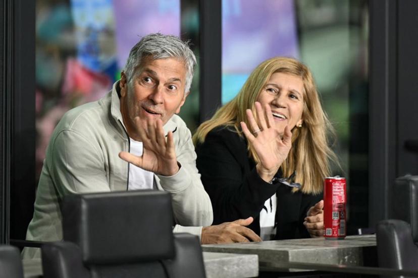 (FILES) Jorge Messi (L) and Celia Cuccittini, parents of Inter Miami's Argentine forward Lionel Messi, wave as they prepare to watch the Major League Soccer (MLS) Eastern Conference final football match between Inter Miami and New York City FC at Chase Stadium in Fort Lauderdale, Florida on November 29, 2025. Jorge Messi, the father and agent of global football star Lionel Messi, has died aged 68 in Rosario, his hometown north of Buenos Aires, Newell's Old Boys - the club where the Argentine captain played as a child - announced on August 8, 2026. Chandan Khanna / AFP