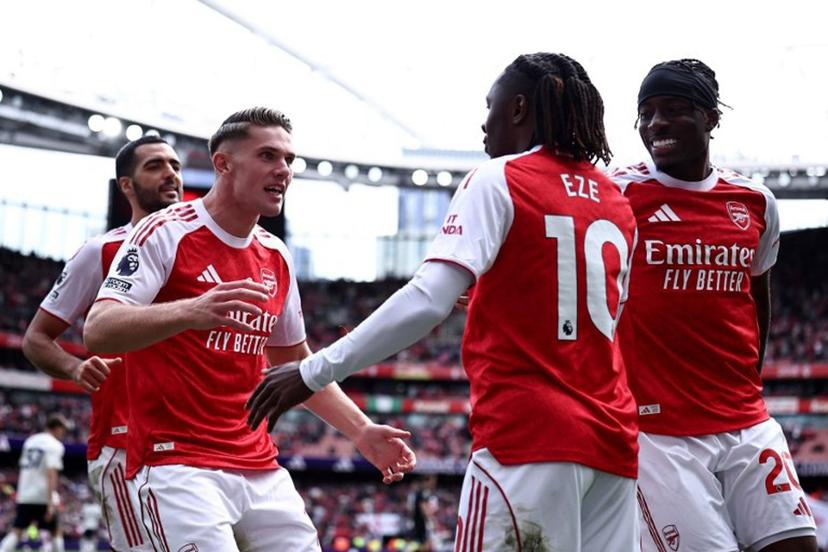 Arsenal's Swedish striker #14 Viktor Gyokeres celebrates scoring the team's second goal with Arsenal's English midfielder #10 Eberechi Eze  during the English Premier League football match between Arsenal and Nottingham Forest at the Emirates Stadium in London on September 13, 2025.   HENRY NICHOLLS / AFP