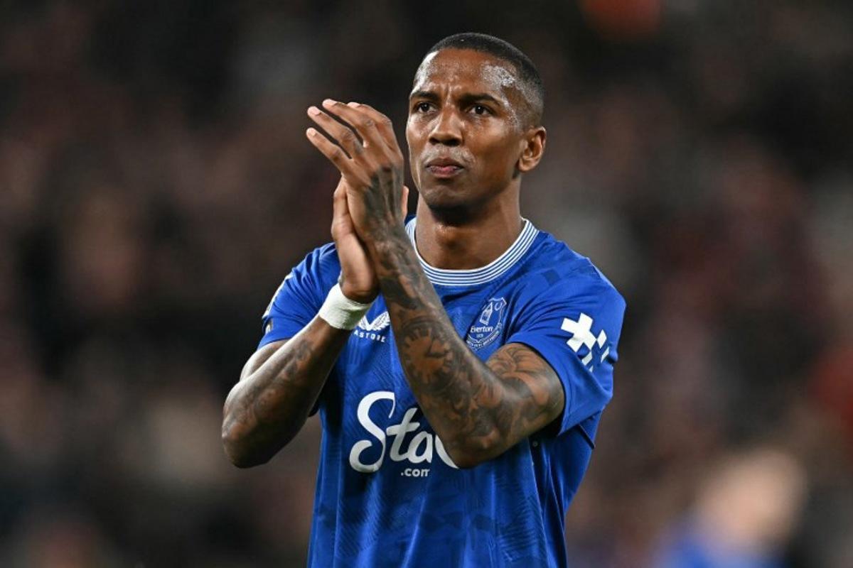 Everton's English defender #18 Ashley Young applauds the fans following the English Premier League football match between Liverpool and Everton at Anfield in Liverpool, north west England on April 2, 2025.  Paul ELLIS / AFP