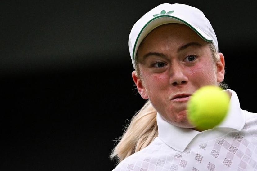 Britain's Sonay Kartal eyes the ball as she returns it to Russia's Anastasia Pavlyuchenkova during their women's singles fourth round tennis match on the seventh day of the 2025 Wimbledon Championships at The All England Lawn Tennis and Croquet Club in Wimbledon, southwest London, on July 6, 2025.  Kirill KUDRYAVTSEV / AFP