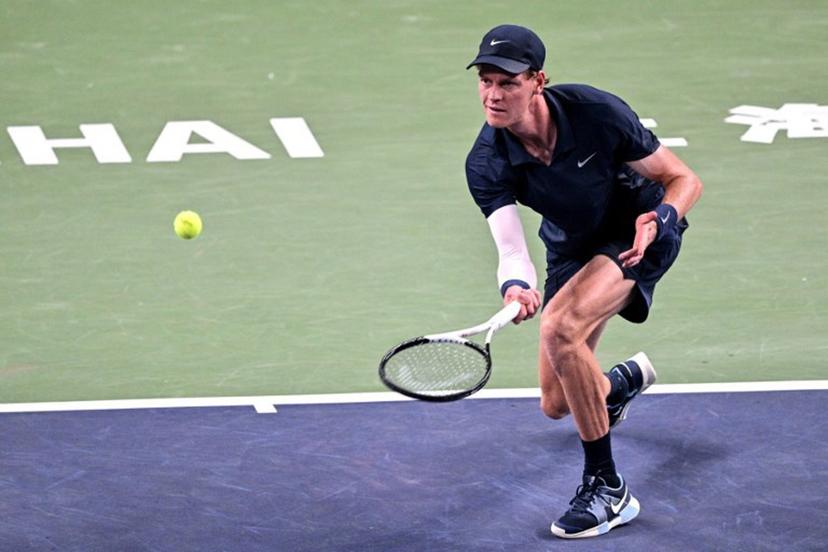 Italy's Jannik Sinner hits a return to Netherlands' Tallon Griekspoor during their men's singles match at the Shanghai Masters tennis tournament in Shanghai on October 5, 2025.  Hector RETAMAL / AFP