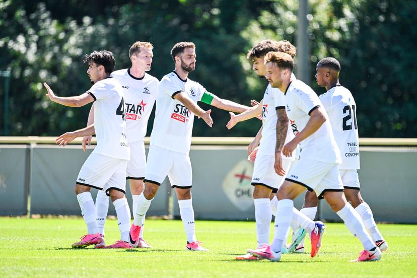 OHL's Thibault Vlietinck, OHL's Siebe Schrijvers and OHL's William Balikwisha celebrate after scoring during a friendly soccer game between OH Leuven vs Crossing Schaarbeek, on Saturday 04 July 2026 in Leuven, in preparation of the upcoming 2026-2027 Belgian first division soccer season. BELGA PHOTO TOM GOYVAERTS