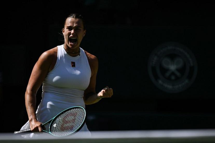 Belarus's Aryna Sabalenka reacts as she plays against Germany's Laura Siegemund during their women's singles quarter-final tennis match on the ninth day of the 2025 Wimbledon Championships at The All England Lawn Tennis and Croquet Club in Wimbledon, southwest London, on July 8, 2025.  Kirill KUDRYAVTSEV / AFP