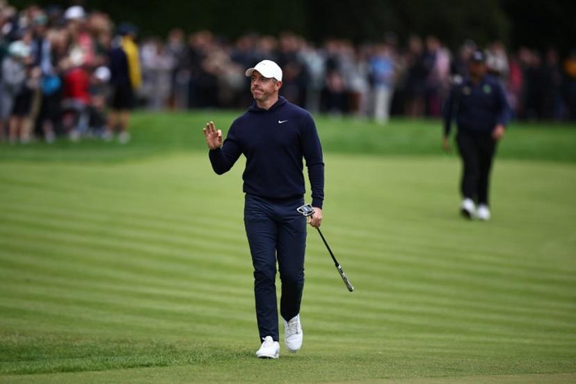 Northern Ireland's Rory McIlroy approaches the 18th green on the fourth day of the BMW PGA Championship at Wentworth Golf Club, south-west of London, on September 14, 2025.  HENRY NICHOLLS / AFP