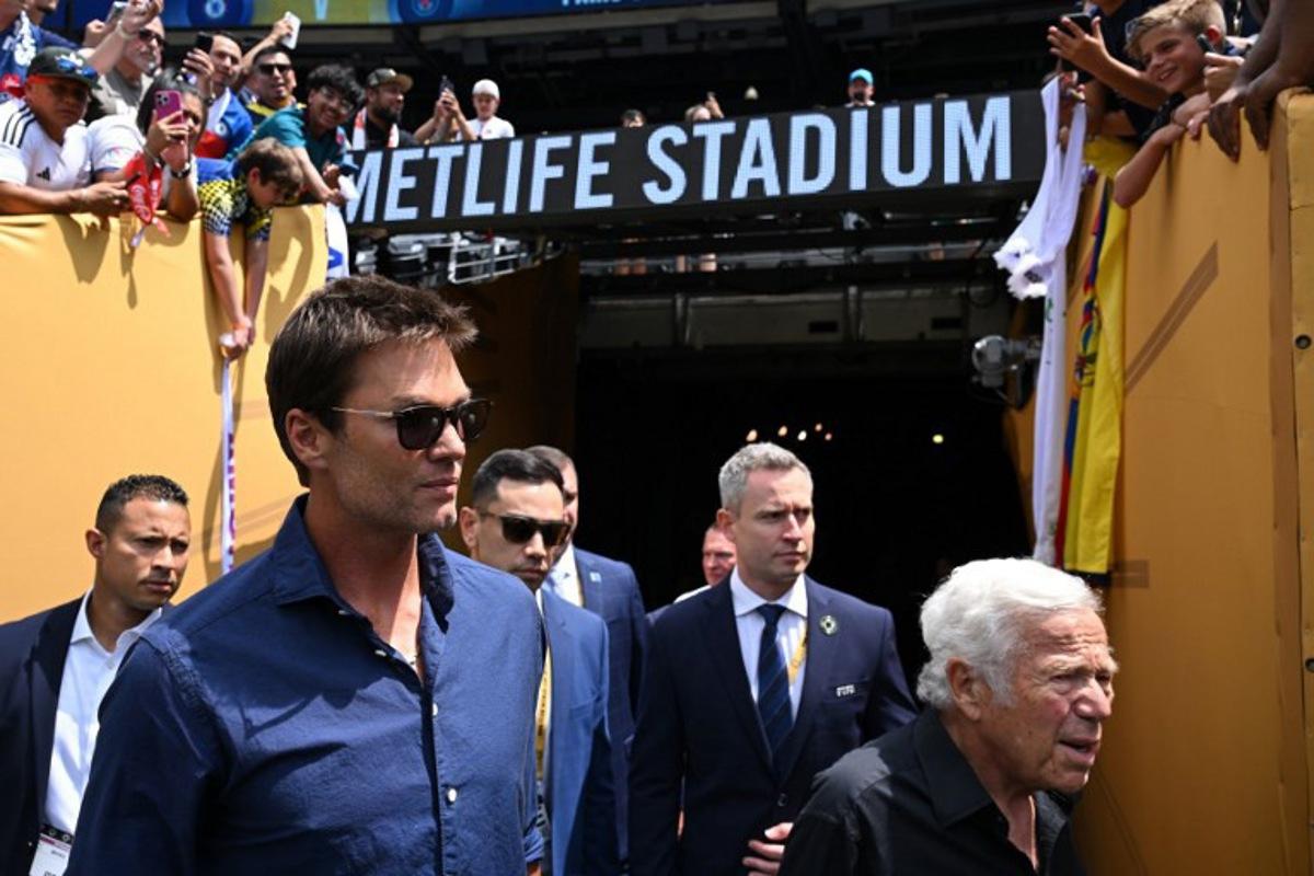 Former NFL player Tom Brady (L) and CEO of New England Patriots Robert Kraft arrive ahead the FIFA Club World Cup 2025 final football match between England's Chelsea and France's Paris Saint-Germain at the MetLife Stadium in East Rutherford, New Jersey on July 13, 2025.  ANGELA WEISS / AFP