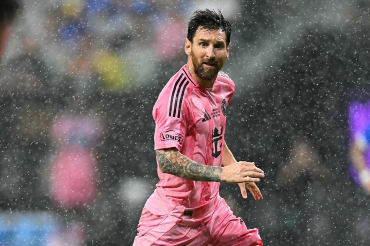 Inter Miami's Argentine forward #10 Lionel Messi runs under a light rain during the Campeones Cup final football match between Inter Miami CF and Mexico's Cruz Azul at Nu Stadium in Miami, Florida, on September 16, 2026.  CHANDAN KHANNA / AFP