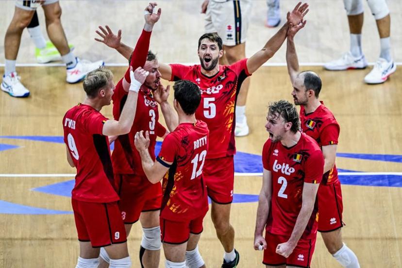 Belgium's players celebrate after scoring a point against Italy during the 2025 Men's Volleyball World Championship at the Araneta Coliseum in Quezon City on September 16, 2025.  SHERWIN VARDELEON / AFP