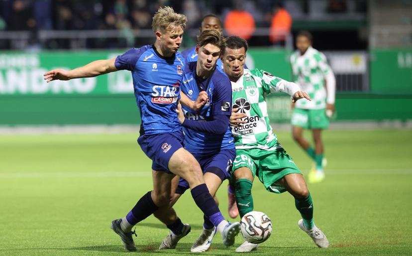 Dender's Luc De Fougerolles, Dender's Luc Marijnissen and RAAL's Owen Maes fight for the ball during a soccer match between RAAL La Louviere and FCV Dender EH, Friday 05 December 2025 in La Louviere, on day 17 of the 2025-2026 'Jupiler Pro League' first division of the Belgian championship. BELGA PHOTO VIRGINIE LEFOUR