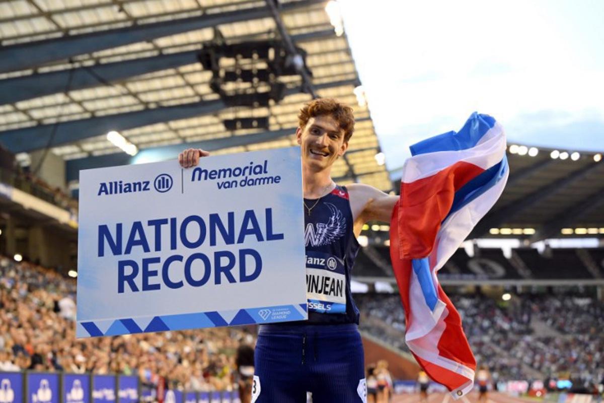 Luxembourg's Ruben Querinjean celebrates after winning and setting a new National Record in the Men's 3000m Steeplechase event of the Diamond League athletics meeting at the King Baudouin Stadium in Brussels on August 22, 2025.  JOHN THYS / AFP