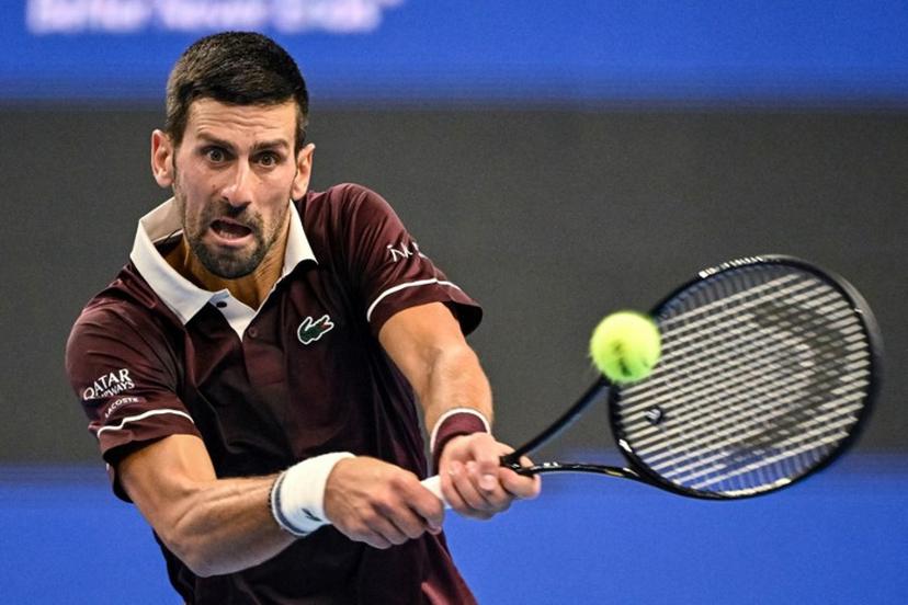 Serbia's Novak Djokovic hits a return to Australia's Alex de Minaur during the men's singles final at the China Open tennis tournament in Beijing on October 6, 2026  GREG BAKER / AFP
