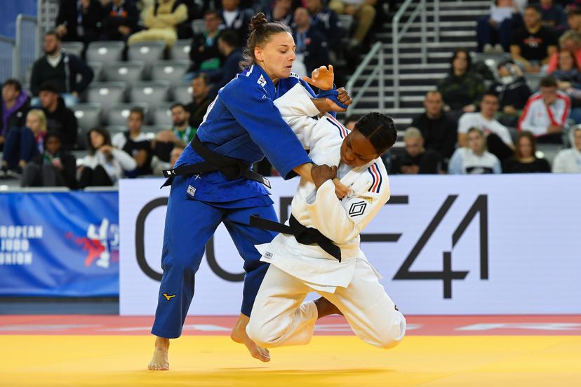 Belgian Mina Libeer (blue) and French Priscilla Gneto (white) pictured in action during a fight in the women's -57kg competition at the European Championships judo in Zagreb, Croatia on Thursday 25 April 2024. The tournament is taking place from 25 tot 27 April.  BELGA PHOTO NIKOLA KRSTIC
