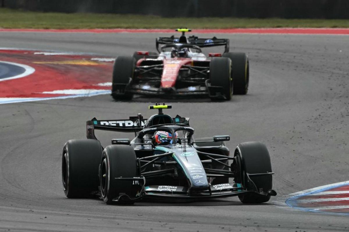 Mercedes' Italian driver Kimi Antonelli races ahead of Ferrari's British driver Lewis Hamilton during the United States Formula One Grand Prix at the Circuit of the Americas in Austin, Texas, on October 25, 2026.  RONALDO SCHEMIDT / AFP