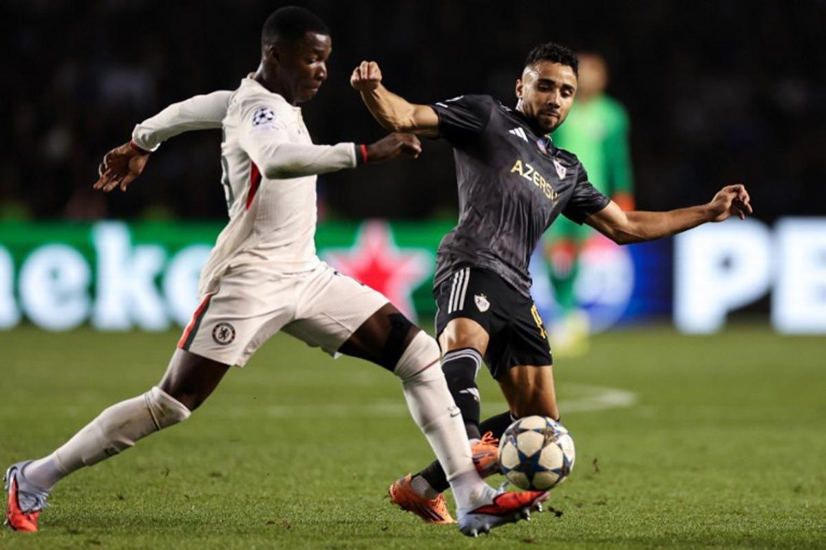 Qarabag's Cape Verdean midfielder #15 Leandro Andrado in action during the UEFA Champions League league phase football match between Qarabag and Chelsea at the Tofiq Bahramov Republican Stadium in Baku on November 5, 2025.  Giorgi ARJEVANIDZE / AFP