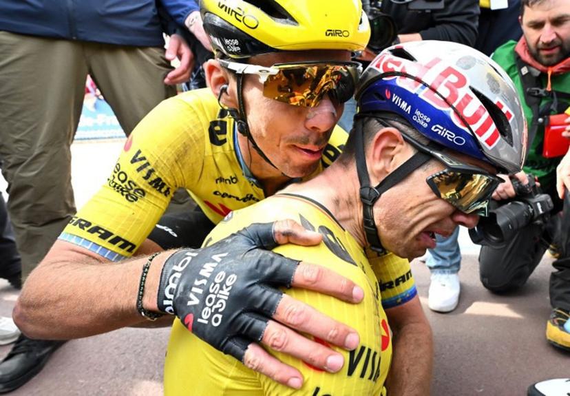 Team Visma - Lease a Bike's French rider Christophe Laporte (L) congratulates winner Team Visma - Lease a Bike's Belgian rider Wout van Aert at the end of the 123rd edition of the Paris-Roubaix one-day classic cycling race, 258.3 km between Compiègne and Roubaix, at the Vélodrome André-Pétrieux in Roubaix, northern France, on April 12, 2026.  Etienne GARNIER / POOL / AFP