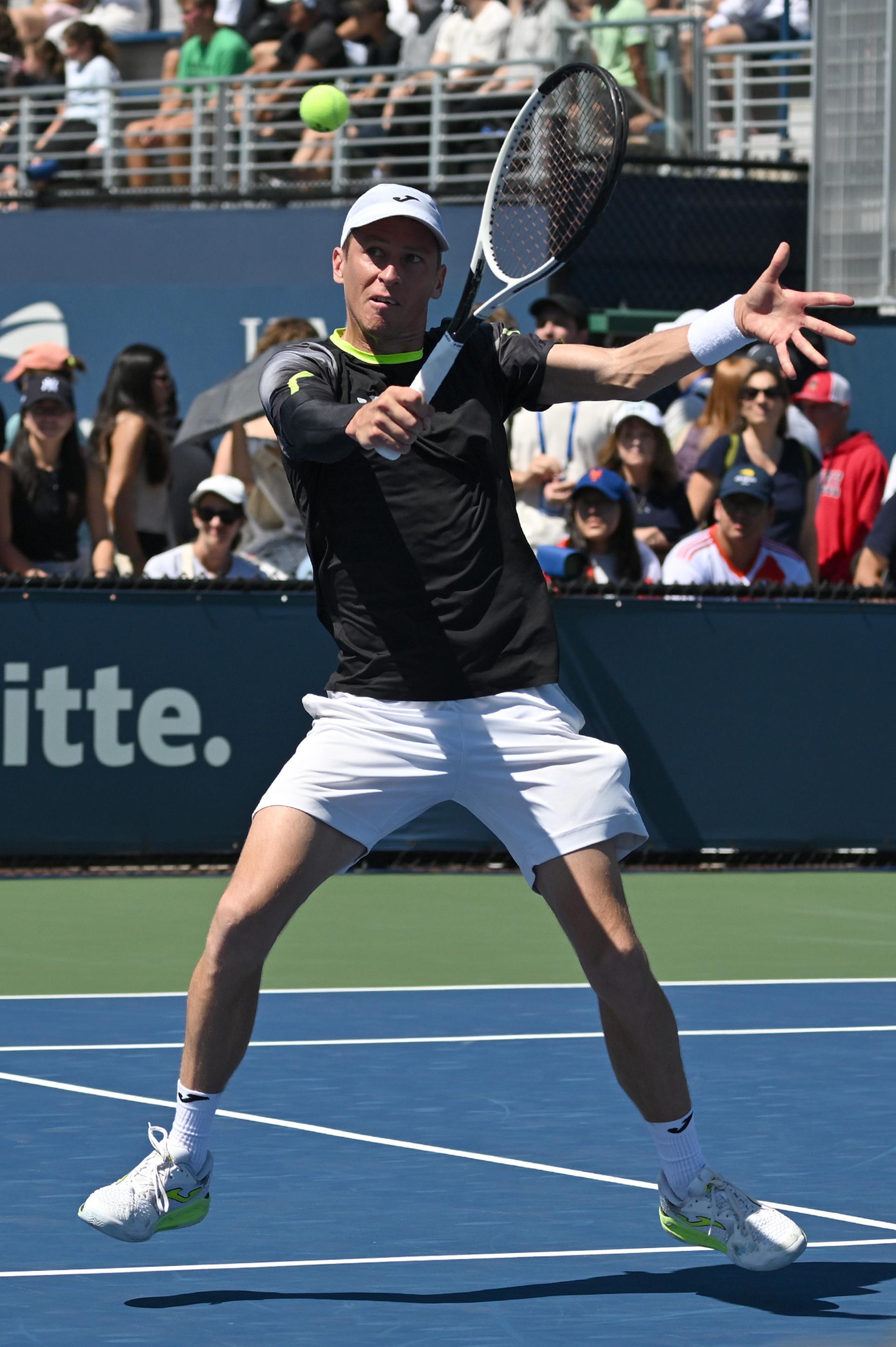 Belgian Kimmer Coppejans pictured in action during a tennis game against Peruvian Buse in the third round of the qualifications for the men's singles of the 2025 US Open Grand Slam tennis tournament in New York City, USA, Friday 22 August 2025. BELGA PHOTO TONY BEHAR