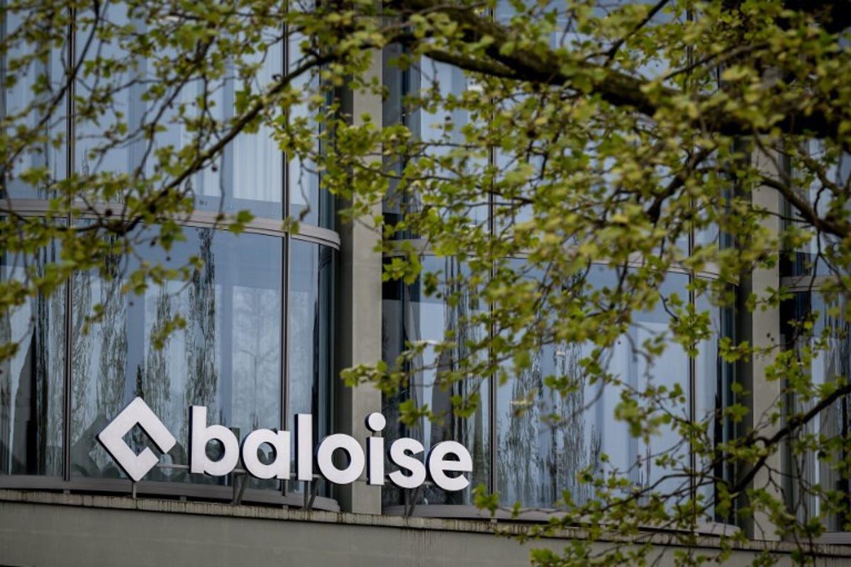 A photo shows the logo of Swiss insurance group Baloise Holding AG in Basel, on April 15, 2026.  Fabrice COFFRINI / AFP