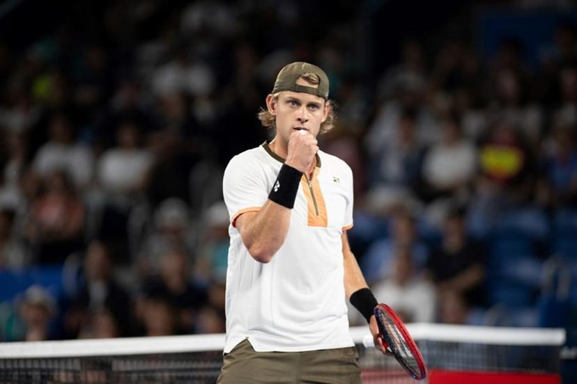 Belgium's Zizou Bergs reacts during his men's singles match against Spain's Carlos Alcaraz at the ATP Japan Open tennis tournament in Tokyo on September 27, 2025.  Philip FONG / AFP