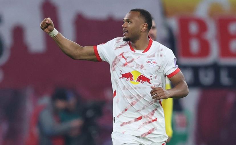 Leipzig's Belgian forward #11 Lois Openda celebrates scoring during the German first division Bundesliga football match between RB Leipzig and Borussia Dortmund in Leipzig, eastern Germany on March 15, 2025.   RONNY HARTMANN / AFP