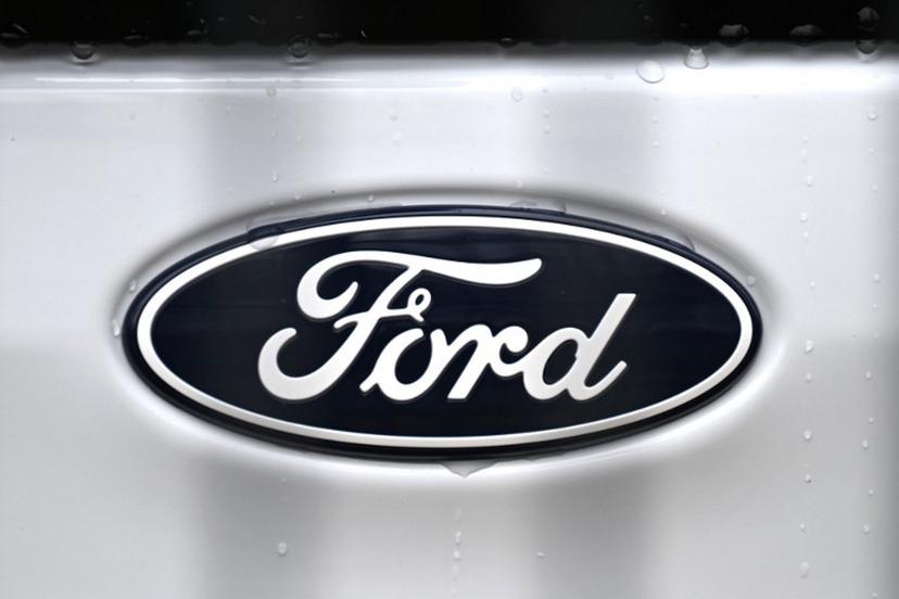 The logo of US car giant Ford is pictured on a car at  a carseller in Gelsenkirchen, western Germany, on November 22, 2024.  Ford on November 20, 2024 announced 4,000 more job cuts in Europe, mostly in Germany and Britain, in the latest blow to the continent's beleaguered car industry. Ina FASSBENDER / AFP