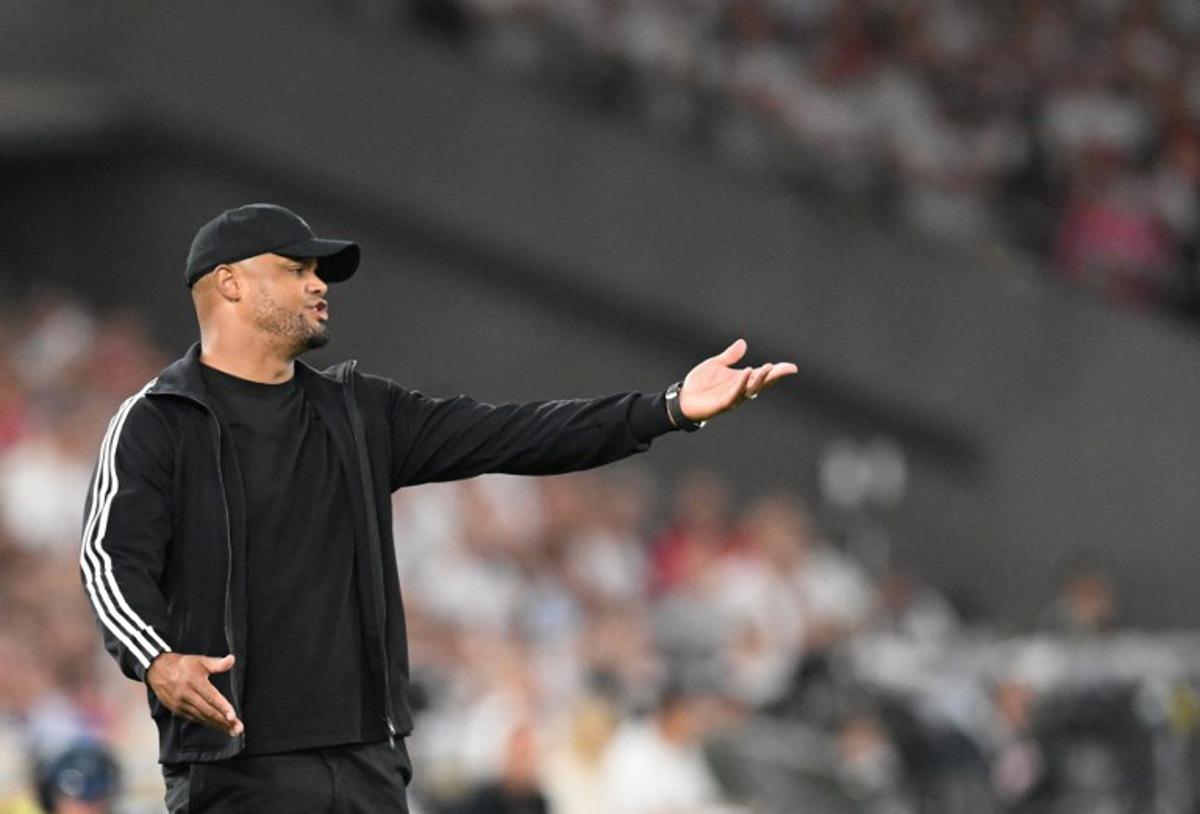 Bayern Munich's Belgian head coach Vincent Kompany reacts during the Franz-Beckenbauer Supercup football match between VfB Stuttgart and FC Bayern Munich in Stuttgart, southern Germany on August 16, 2025. Originally established in 1987 by the German Football Association (DFB) as the as the DFB-Supercup, The Franz Beckenbauer Supercup, is a single football match between the Bundesliga champion and the DFB-Pokal winner, organized by the German Football League (DFL). THOMAS KIENZLE / AFP