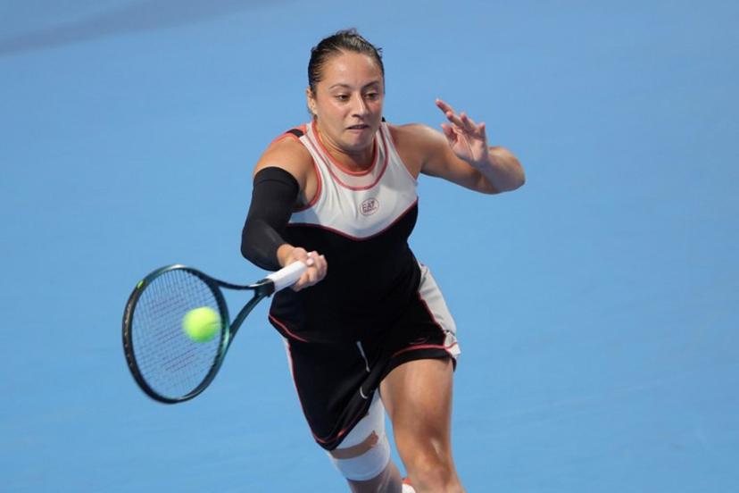 Italy's Elisabetta Cocciaretto hits a return to USA's Ann Li during their women's singles quarter-final match at the Guangzhou Open tennis tournament in Guangzhou, China's southern Guangdong province on October 24, 2025.  -STR / AFP