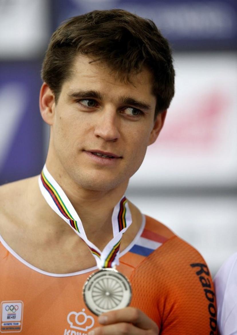 Silver medallist Netherland's Theo Bos poses on the podium after the Men's Kilo TT final during the 2016 Track Cycling World Championships at the Lee Valley VeloPark in London on March 3, 2016  ADRIAN DENNIS / AFP