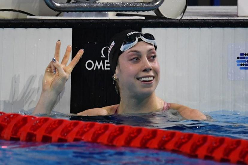 US Gretchen Walsh celebrates winning the Women's 100 meters Butterfly final during the World Aquatics Swimming Championships (25 m) 2024 at Duna Arena in Budapest, on December 14, 2024.   Ferenc ISZA / AFP