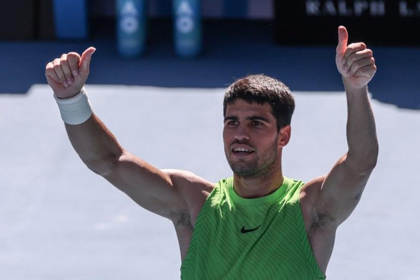 Spain's Carlos Alcaraz celebrates after winning against Germany's Yannick Hanfmann during their men's singles match on day four of the Australian Open tennis tournament in Melbourne on January 21, 2026.  IZHAR KHAN / AFP