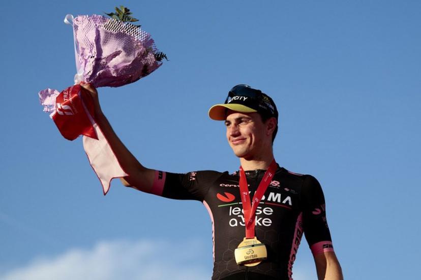 Team Visma-Lease a Bike's Dutch rider Olav Kooij celebrates on the podium after winning the 21st and last stage of the 108th Giro d'Italia cycling race of 143kms from Rome to Rome on June 1, 2025.  Luca Bettini / AFP