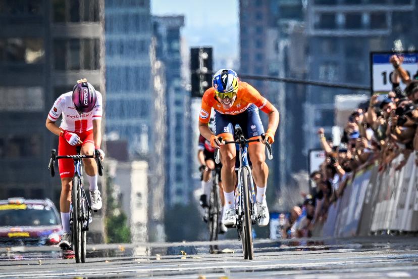 Dutch Demi Vollering celebrates as she crosses the finish line to win the elite women Road Race race (180,4 km) at the cycling World Championship, in Montreal, Canada, Saturday 26 September 2026. The UCI road world championships are taking place from 20 to 27 September, in Montreal, Canada. BELGA PHOTO JASPER JACOBS