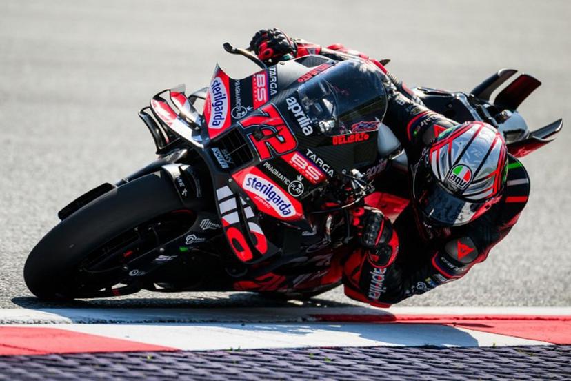 Aprilia Racing team's Italian MotoGP rider Marco Bezzecchi drives during the practice session of motorcycle Austrian Moto GP Grand Prix at the Red Bull ring circuit in Spielberg, Austria, on August 15, 2025.   Jure Makovec / AFP