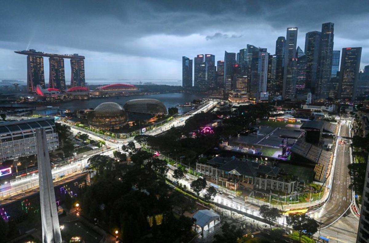 This photo shows the road circuit illuminated for the the upcoming Formula One Singapore Grand Prix at the Marina Bay Street Circuit in Singapore on October 1, 2025.  Roslan RAHMAN / AFP