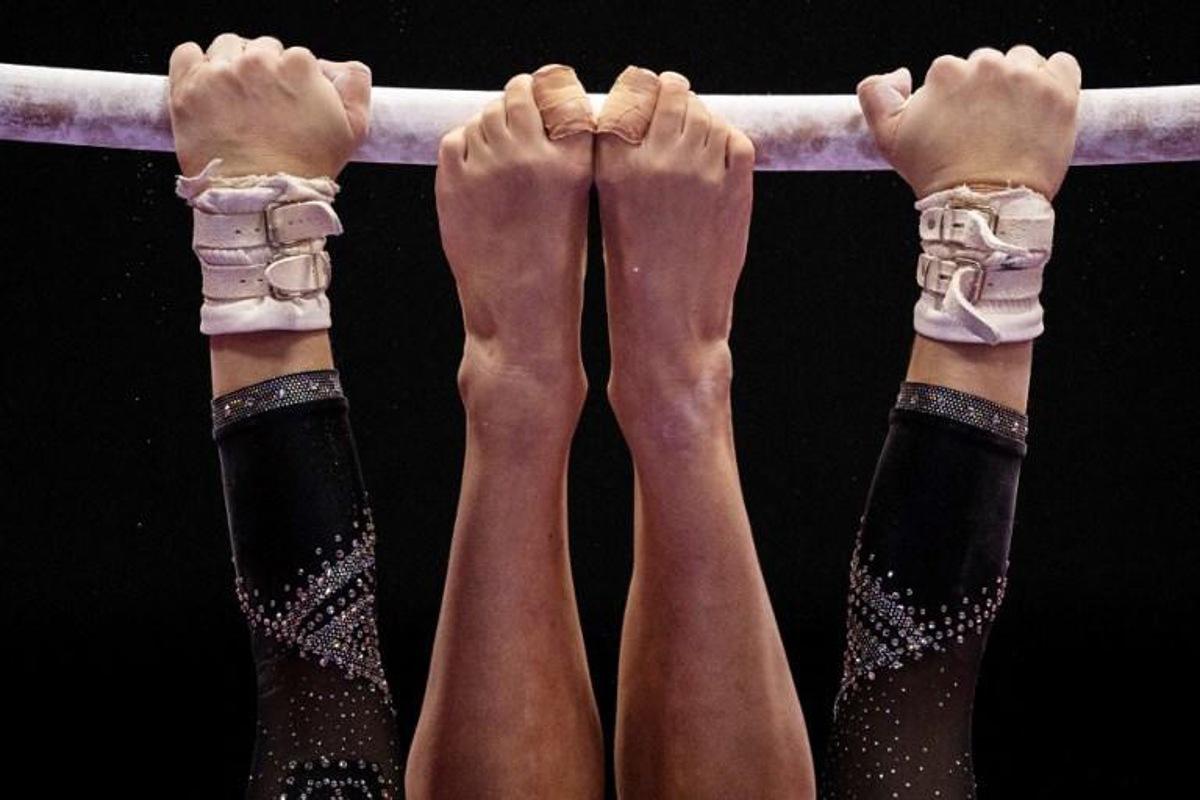 Italy's Asia D'amato competes in the uneven bars event at the women¿s team qualification during the Artistic Gymnastics World Championships at the Kitakyushu City Gymnasium in Kitakyushu, Fukuoka prefecture on October 18, 2021.  Philip FONG / AFP