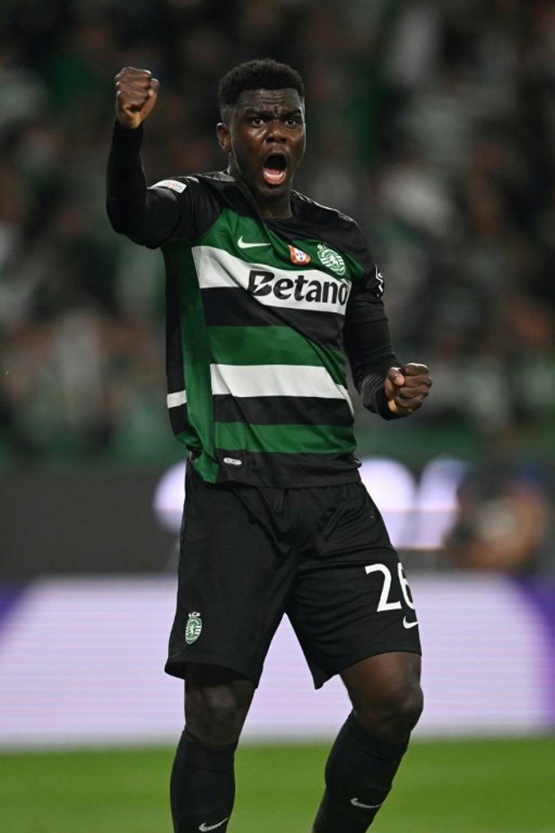 Sporting Lisbon's Ivorian defender #26 Ousmane Diomande reacts after Manchester City's Norwegian striker #09 Erling Haaland failed to score from the penalty spot during the UEFA Champions League, league phase day 4 football match between Sporting Lisbon and Manchester City at the Jose Alvalade stadium in Lisbon on November 5, 2024.  PATRICIA DE MELO MOREIRA / AFP