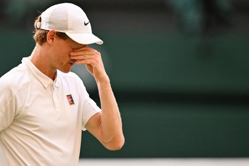 Italy's Jannik Sinner celebrates after victory against Spain's Carlos Alcaraz at the end of their men's singles final tennis match on the fourteenth day of the 2025 Wimbledon Championships at The All England Lawn Tennis and Croquet Club in Wimbledon, southwest London, on July 13, 2025.  Kirill KUDRYAVTSEV / AFP