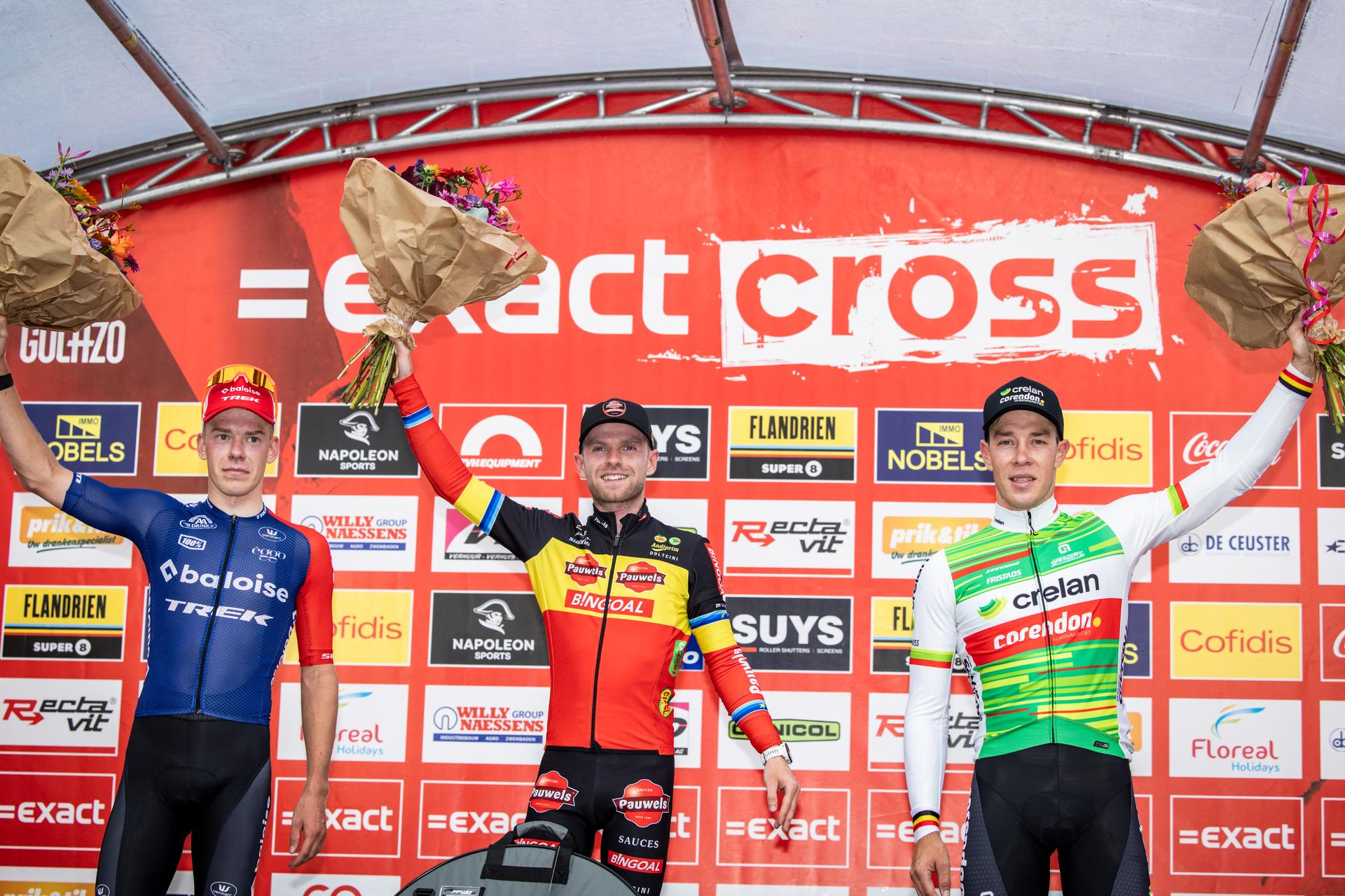 Dutch Pim Ronhaar, Belgian Eli Iserbyt and Belgian Laurens Sweeck pictured on the podium after the men's elite race of the Exact Cross, stage 3 (out of 7) in the Exact Cross cyclocross competition, in Heerderstrand, Netherlands, Saturday 26 October 2024. BELGA PHOTO DAVID PINTENS